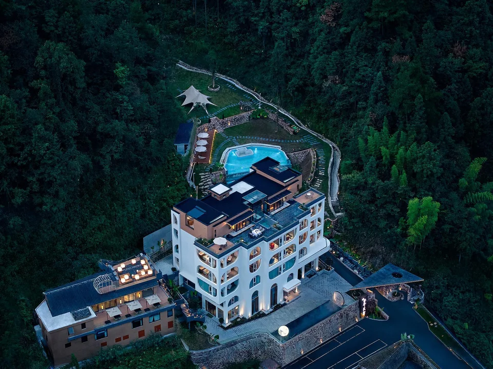 Guesthouse exterior and surrounding mountains