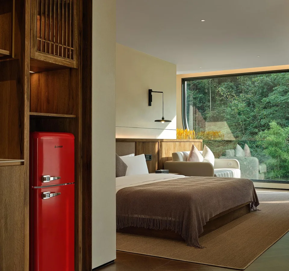 Double bed and window view in a suite