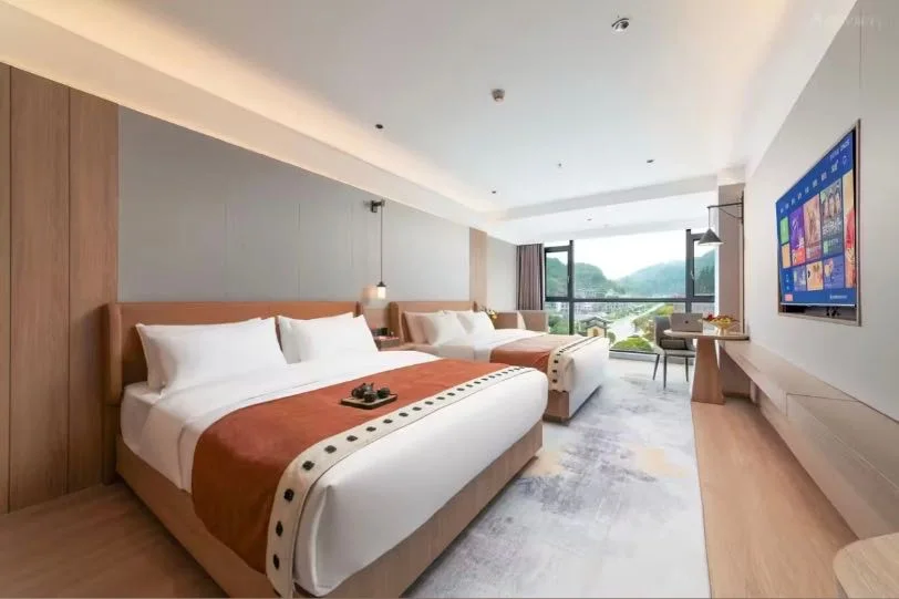 Twin room at Fenghuang Ouyin Hot Spring Resort Hotel