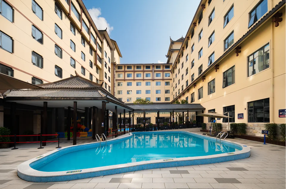 Courtyard pool enclosed by Yunju Hotel buildings